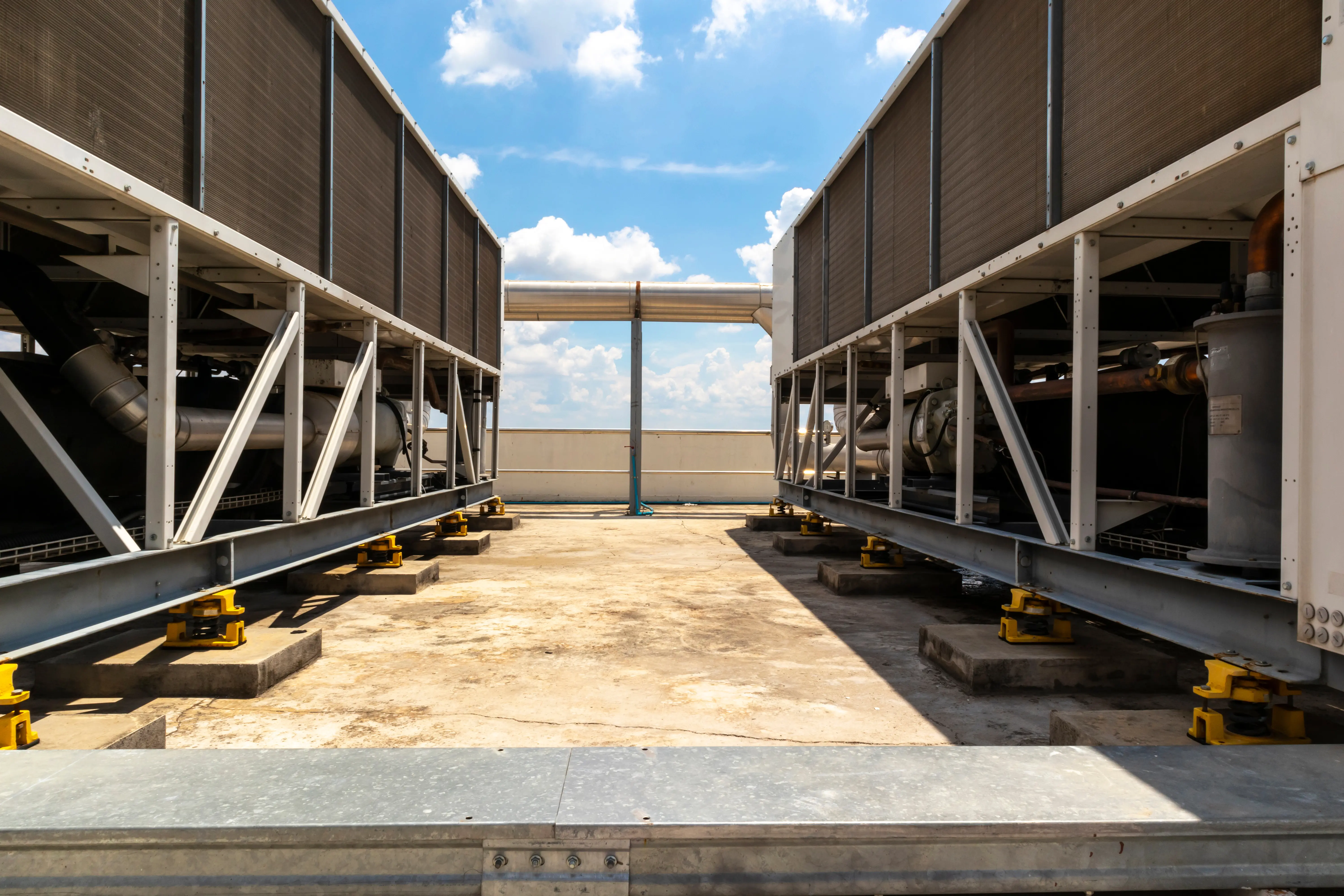 Teacher and student in a classroom equiped with Air-Cooled Chillers