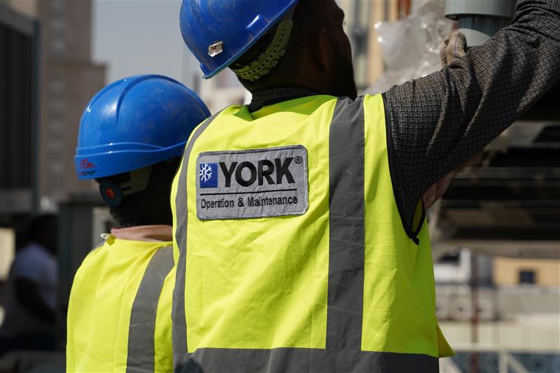 YORK operations engineers performing HVAC system maintenance